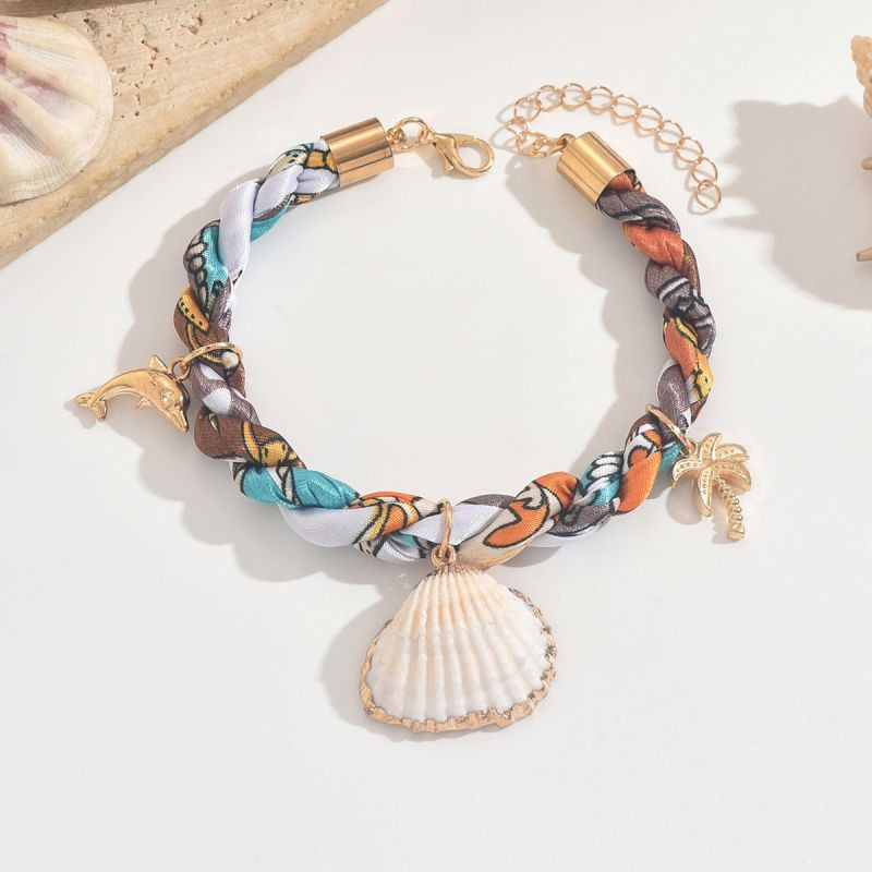 Браслет-нить с крупной жемчужиной и ракушкой CJR61372 Браслет-нить с крупной жемчужиной и ракушкой CJR61372