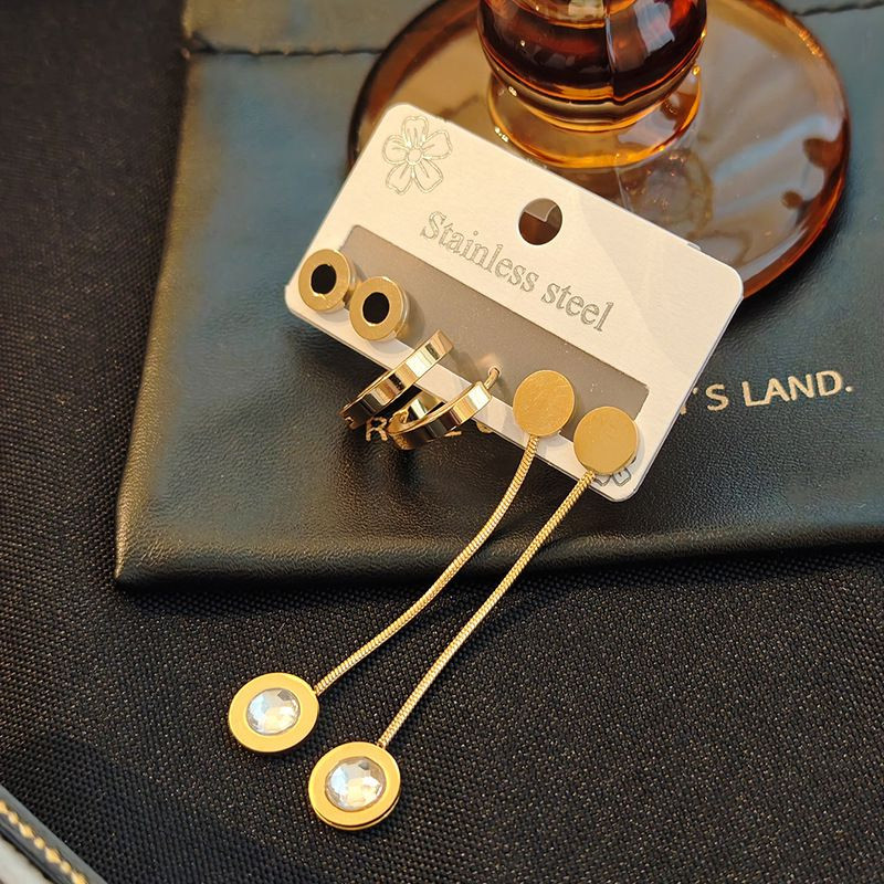 Набор золотистых серег из стали с черной эмалью и длинными подвесками J11494CJJ