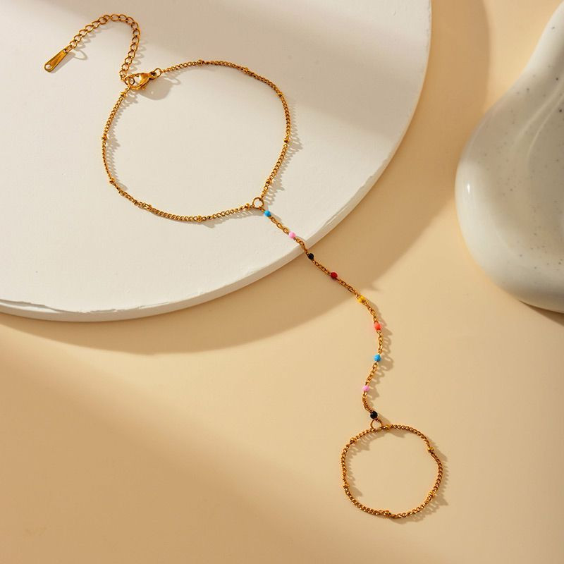 Слейв-браслет гранатовые искры на золотом фоне Слейв-браслет гранатовые искры на золотом фоне