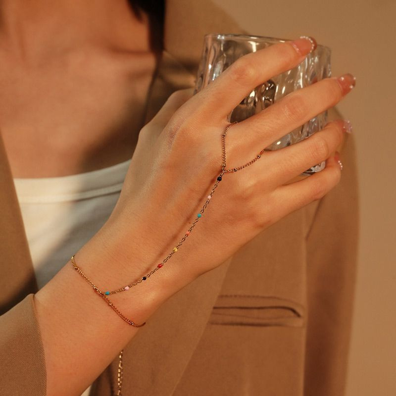 Слейв-браслет гранатовые искры на золотом фоне Слейв-браслет гранатовые искры на золотом фоне