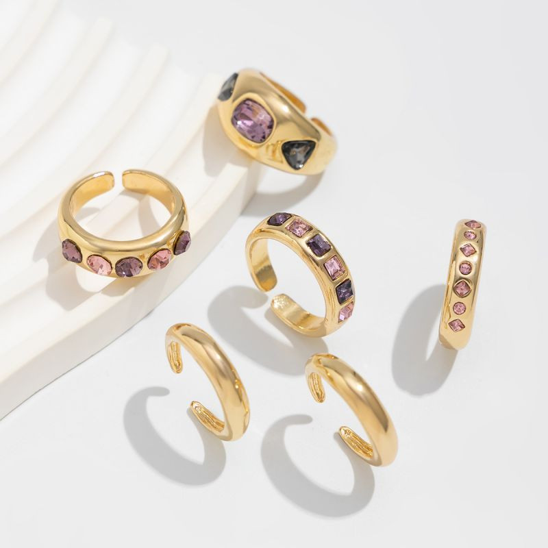 Набор золотистых колец с зеленым камнем и жемчугом CJL23019