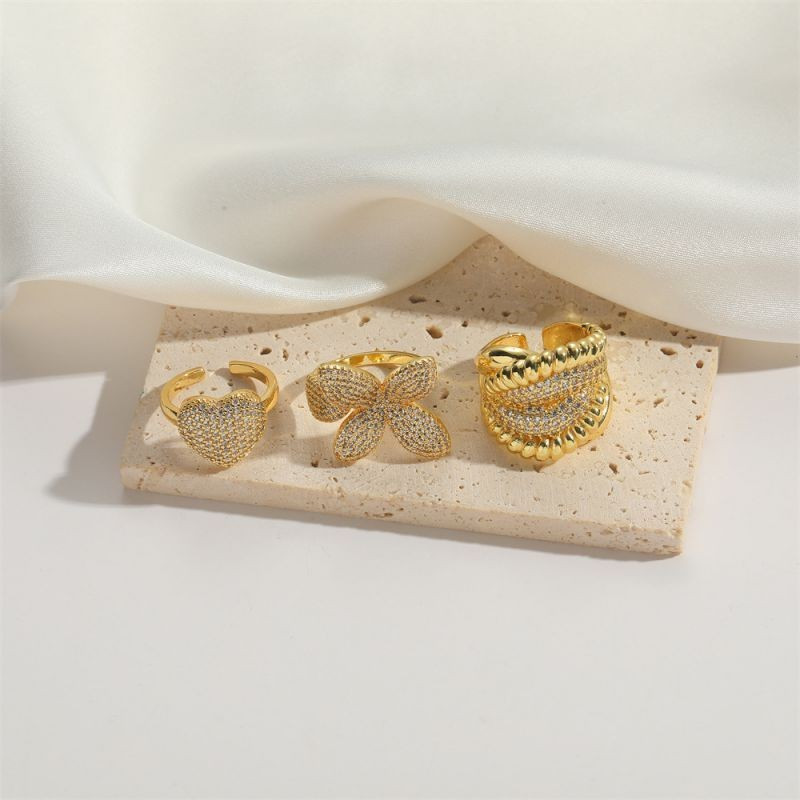 Кольцо широкое переплетенное с инкрустацией CJG29649