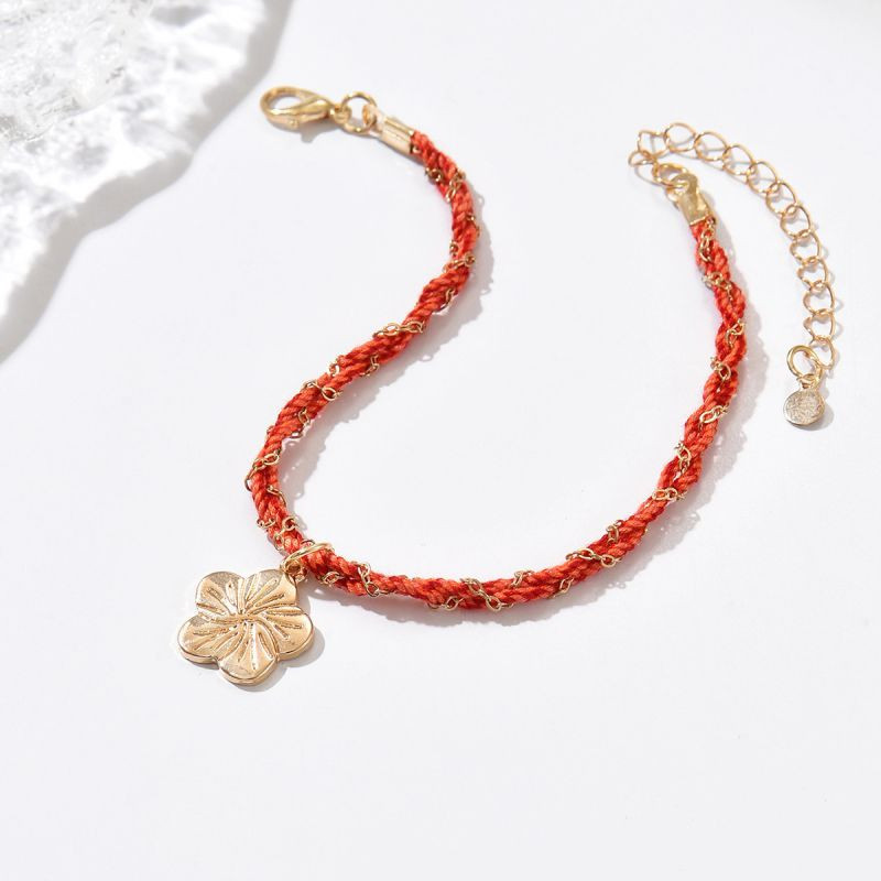 Браслет-нить с золотистым клевером CJR61481