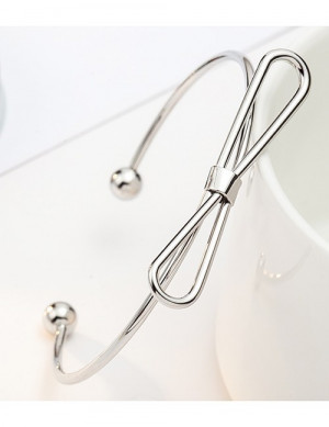 Браслет жесткий разомкнутый в виде контура банта R12886 Браслет жесткий разомкнутый в виде контура банта R12886