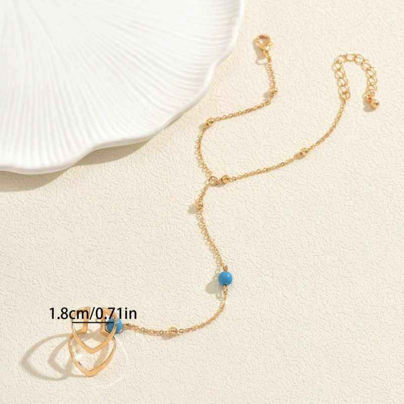 Браслет-слейв с бирюзовыми вставками CJT17386