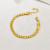Браслет-цепочка из мелких золотистых шариков CJR56266