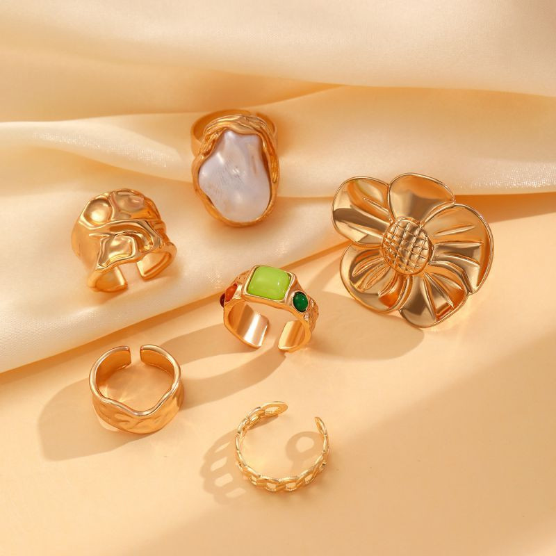 Набор золотистых колец с подвесками и бантом CJL30109