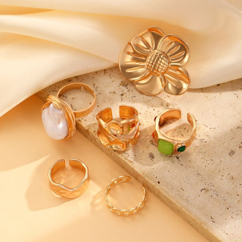 Набор золотистых колец с подвесками и бантом CJL30109