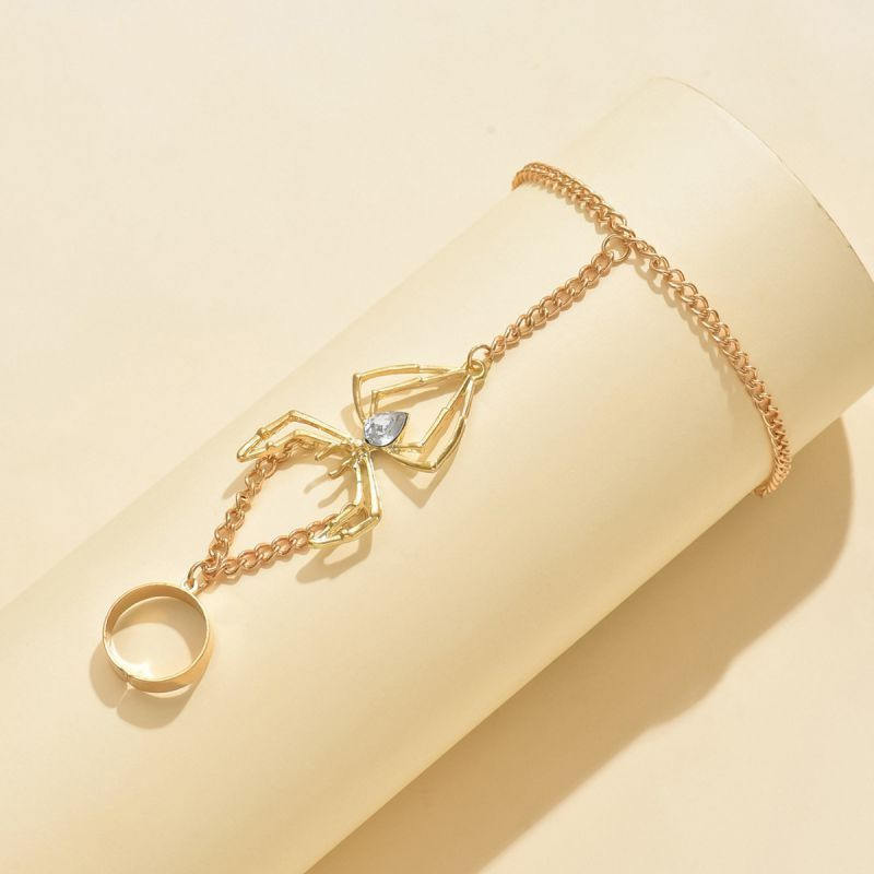 Слейв-браслет золотая паутина с кристальным сердцем CJF59379