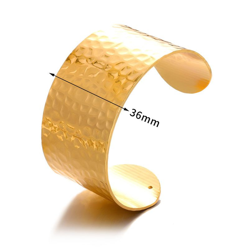 Браслет жёсткий титановая сталь напыление золотом 1J12202CJJ