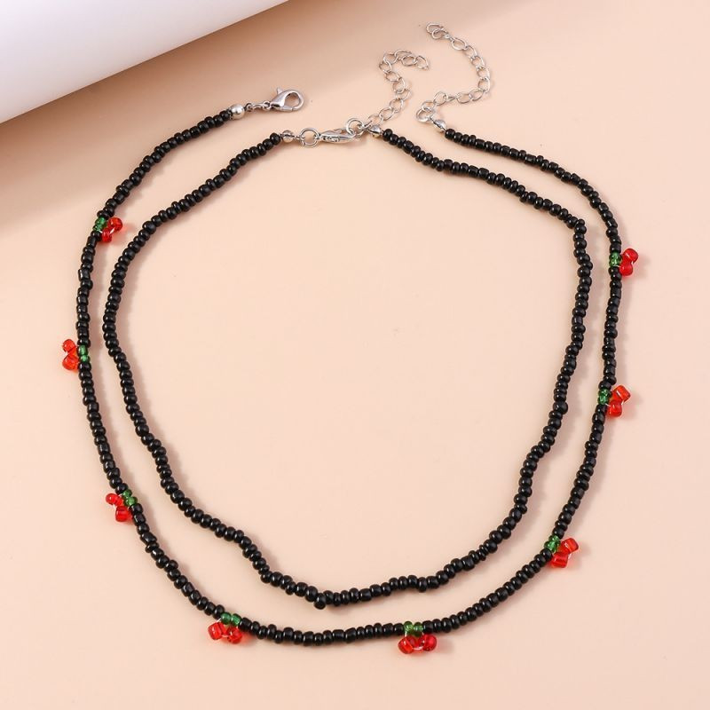 Двойная цепочка из бисера с красными ягодами CJG44232