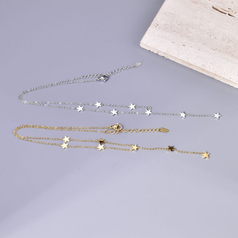 Золотистая цепочка-галстук с россыпью мелких звезд CJL14397