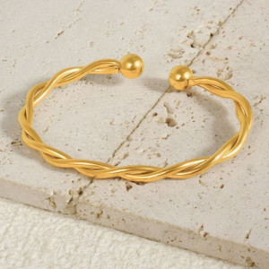 Браслет жесткий витой золотистого цвета с шариками CJH70467 Браслет жесткий витой золотистого цвета с шариками CJH70467