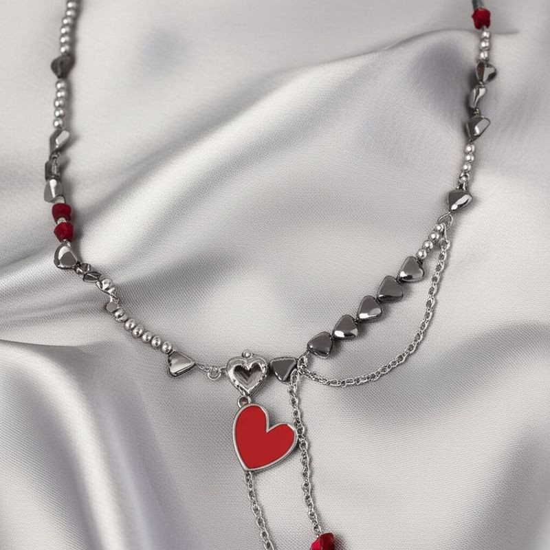 Этническое колье с подвеской-сердцем и кистями 1J11875CJJ