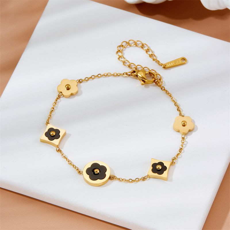Браслет-цепочка с черными цветами и клевером CJH37248 Браслет-цепочка с черными цветами и клевером CJH37248