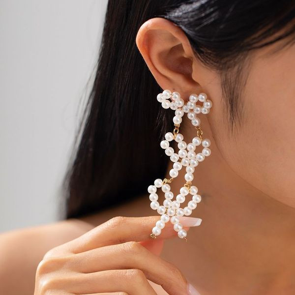 Длинные вечерние серьги из трех жемчужных бантов CJL50429