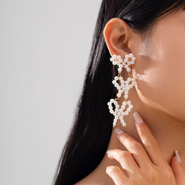 Длинные вечерние серьги из трех жемчужных бантов CJL50429