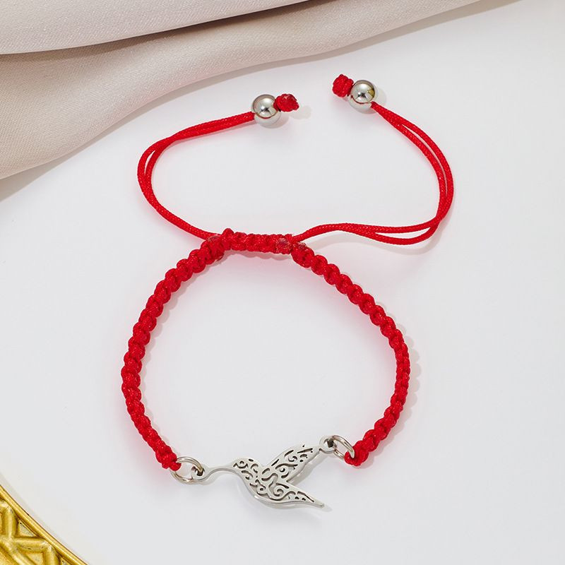 Браслет плетеная нить с золотистой летящей птицей CJQ65901