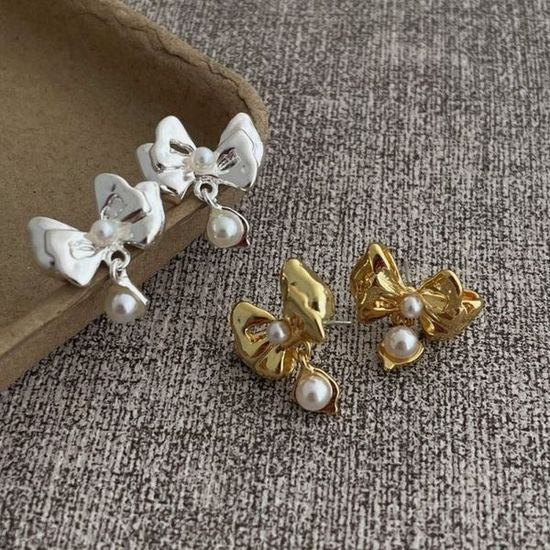 Маленькие серьги пусеты в форме золотистых бантов CJL14768 Маленькие серьги пусеты в форме золотистых бантов CJL14768