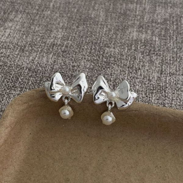 Маленькие серьги пусеты в форме золотистых бантов CJL14768 Маленькие серьги пусеты в форме золотистых бантов CJL14768