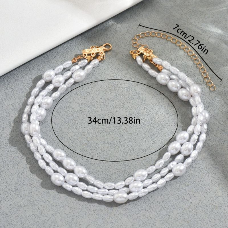 Трехрядный жемчужный чокер с круглыми перемычками CJT17371