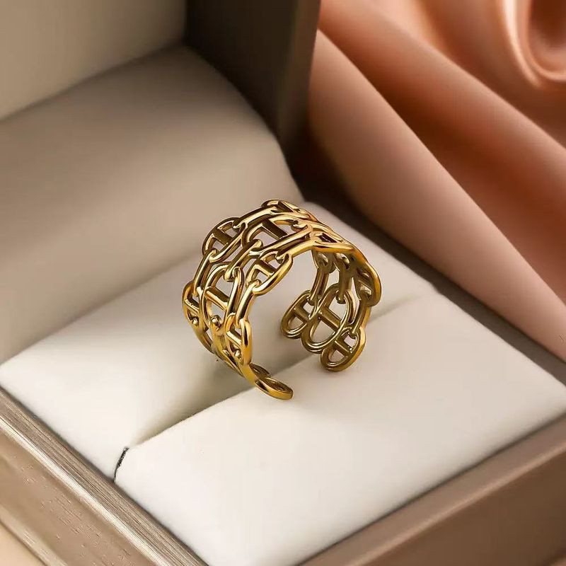 Широкое золотистое кольцо с тройным якорным плетением 1J12386CJJ