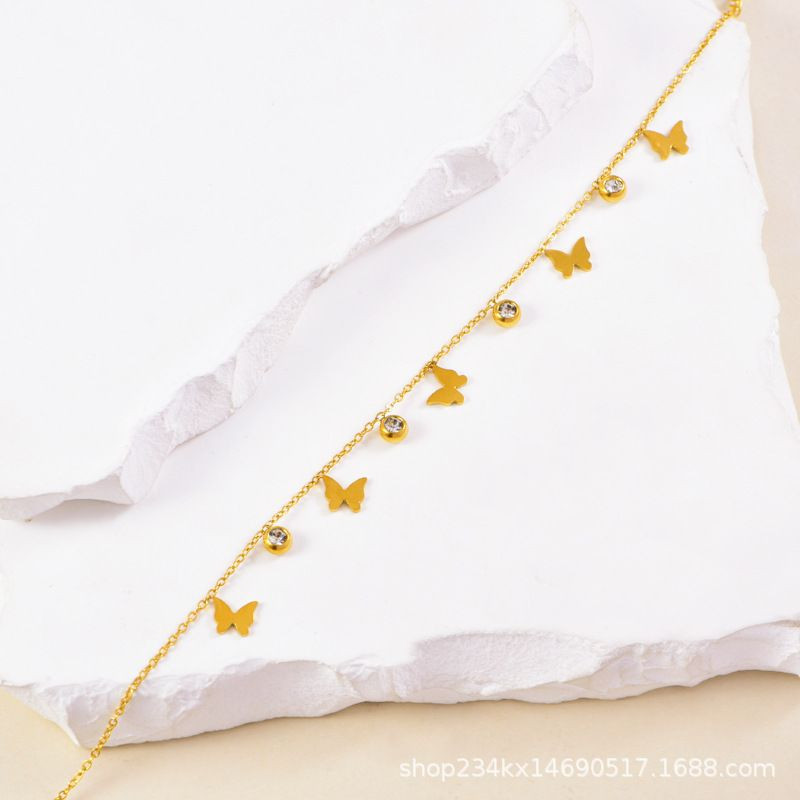 Браслет нежный с подвесками-бабочками и кристаллами CJL34031