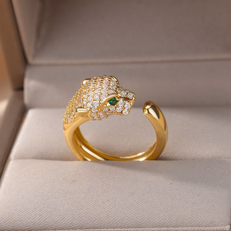 Кольцо в виде головы пантеры с зелеными глазами 1J12064CJJ Кольцо в виде головы пантеры с зелеными глазами 1J12064CJJ