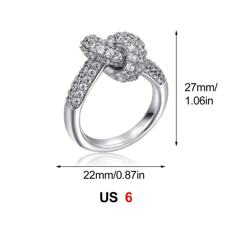 Золотистое кольцо с узлом и дорожкой кристаллов CJS97515