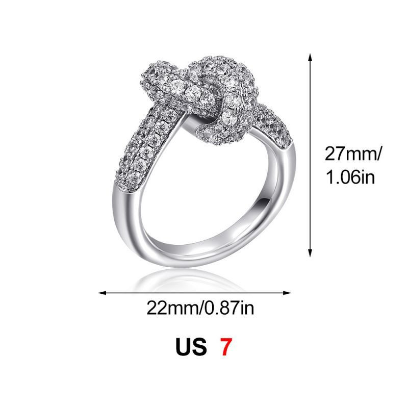 Золотистое кольцо с узлом и дорожкой кристаллов CJS97515