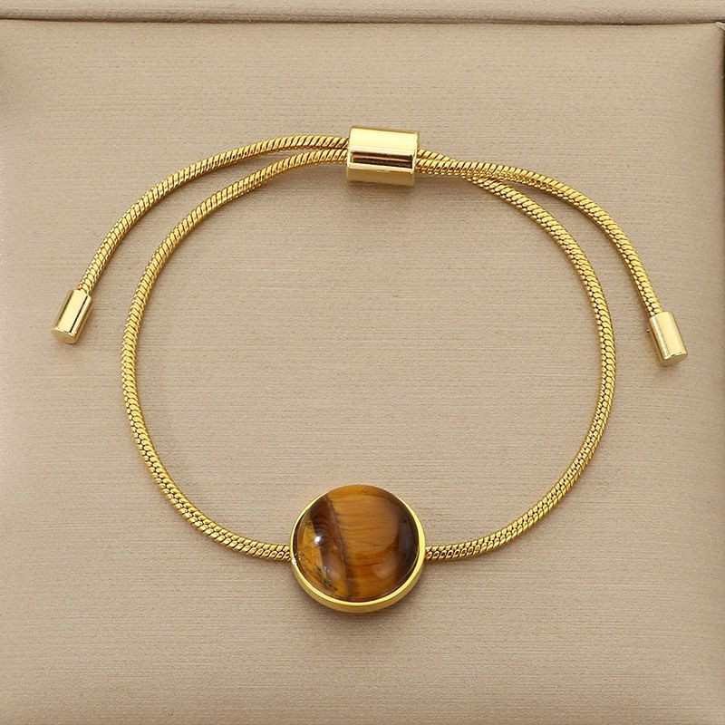 Браслет-слайдер с тигровым глазом в золотистом обрамлении CJN42724