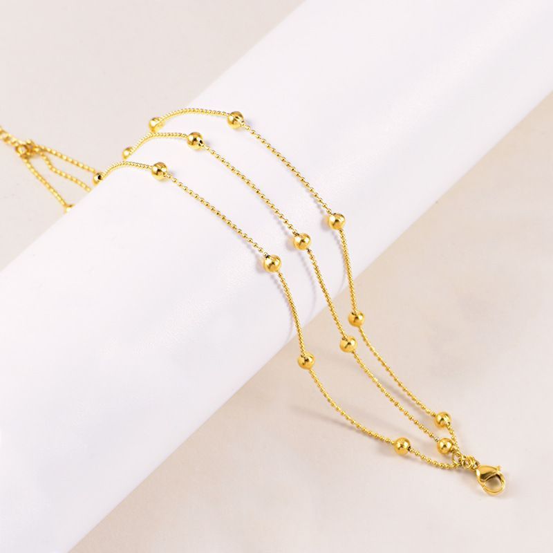 Браслет многослойный из тонких цепей с шариками CJL34046