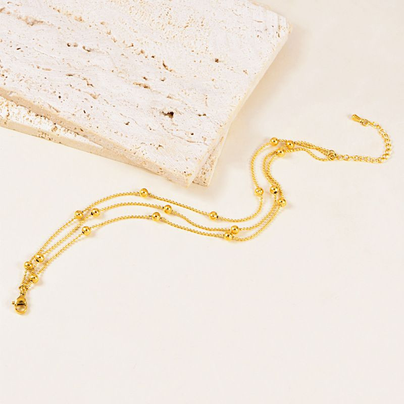 Браслет многослойный из тонких цепей с шариками CJL34046