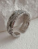 Серебристое кольцо с фактурой помятого металла T93982