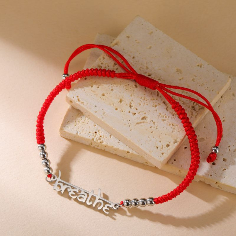 Браслет плетеная нить с серебристым перевернутым месяцем CJK60412