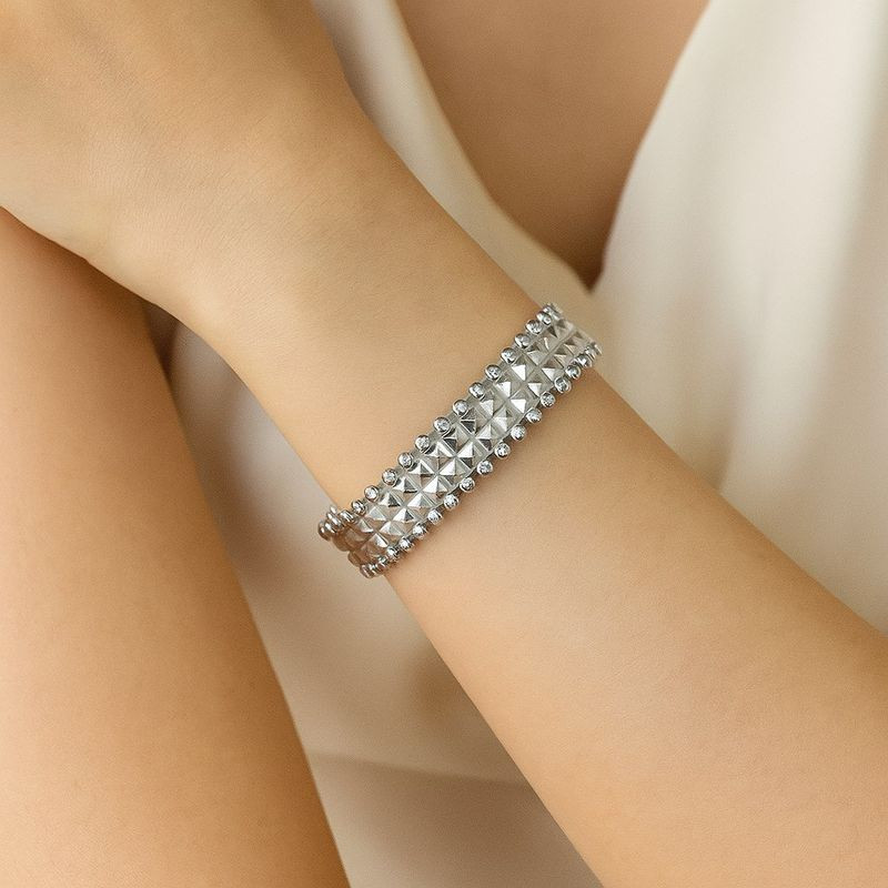 Браслет жесткий ажурный из титановой стали с перфорацией 1J12208CJJ