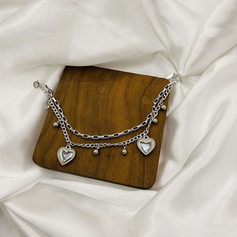 Браслет серебристый многослойный с сердцем в ретро-стиле CJX87542 Браслет серебристый многослойный с сердцем в ретро-стиле CJX87542