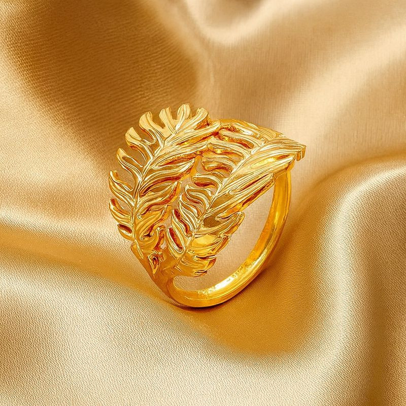 Массивное золотистое кольцо в форме переплетенных листьев 1J12371CJJ