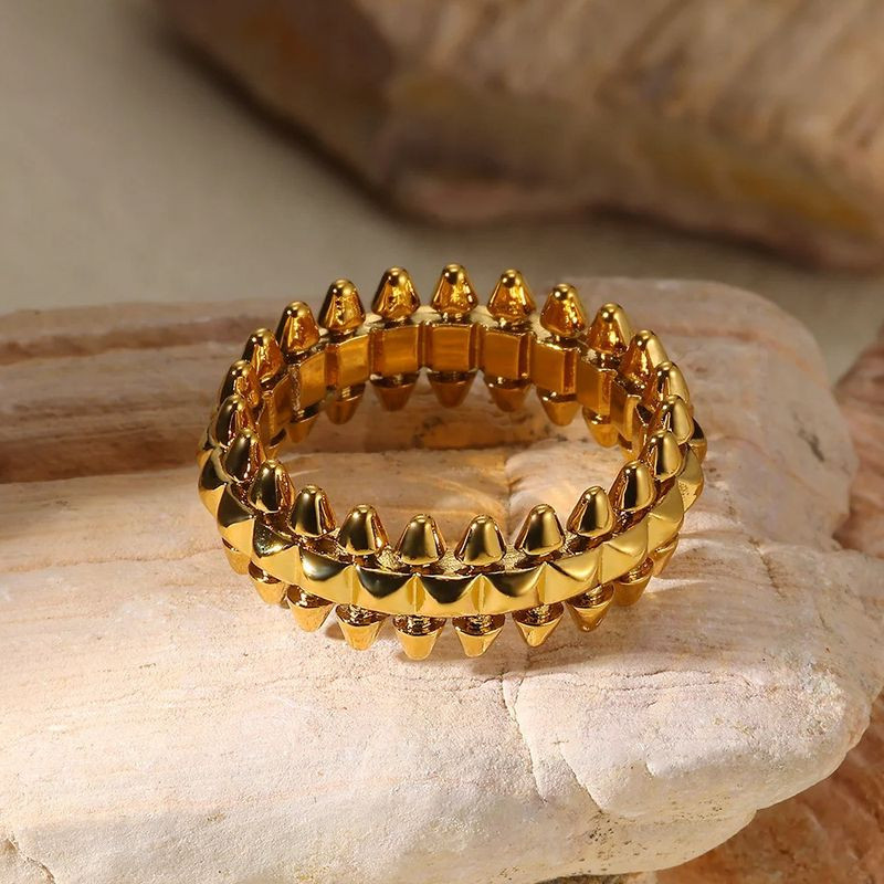 Золотистое стальное кольцо с острыми шипами 1J12068CJJ