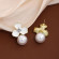 Романтичные серьги-пусеты Белые трилистники с крупным жемчугом CJG39546