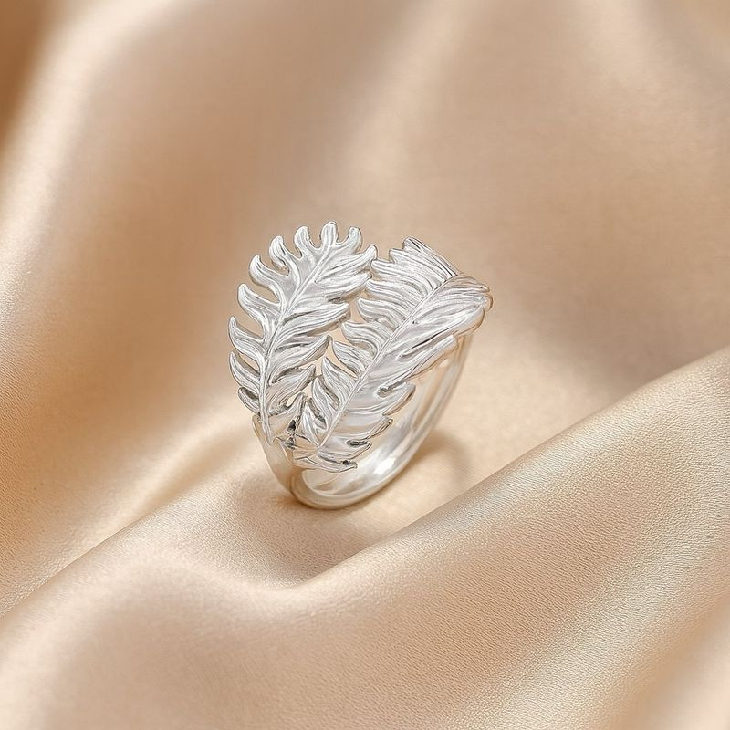 Широкое кольцо из титановой стали в форме двойного пера 1J12372CJJ Широкое кольцо из титановой стали в форме двойного пера 1J12372CJJ