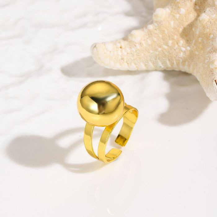 Разомкнутое кольцо с двойной шинкой и крупной золотистой сферой CJM67800