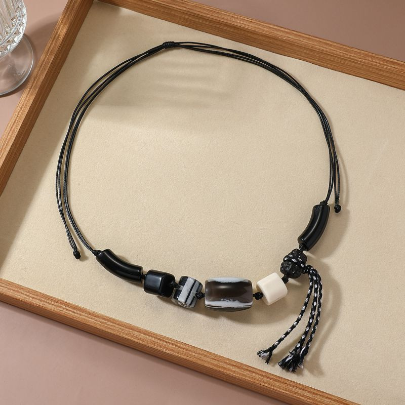 Бохо-колье на шнуре с металлической кистью и миксом бусин CJR57288