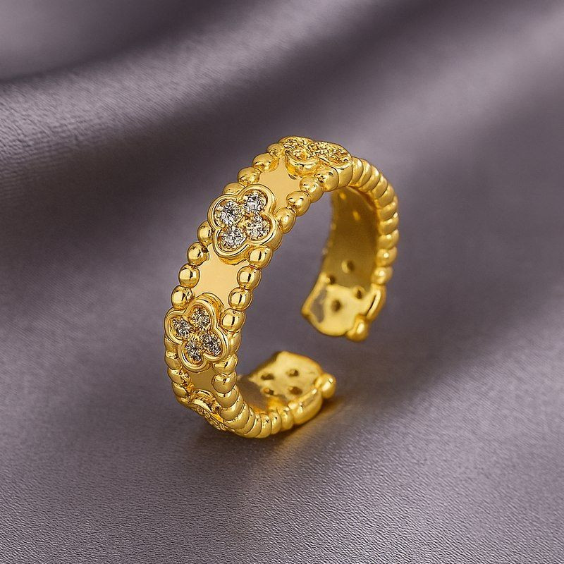 Разомкнутое кольцо с клевером и фактурным краем 1J12070CJJ