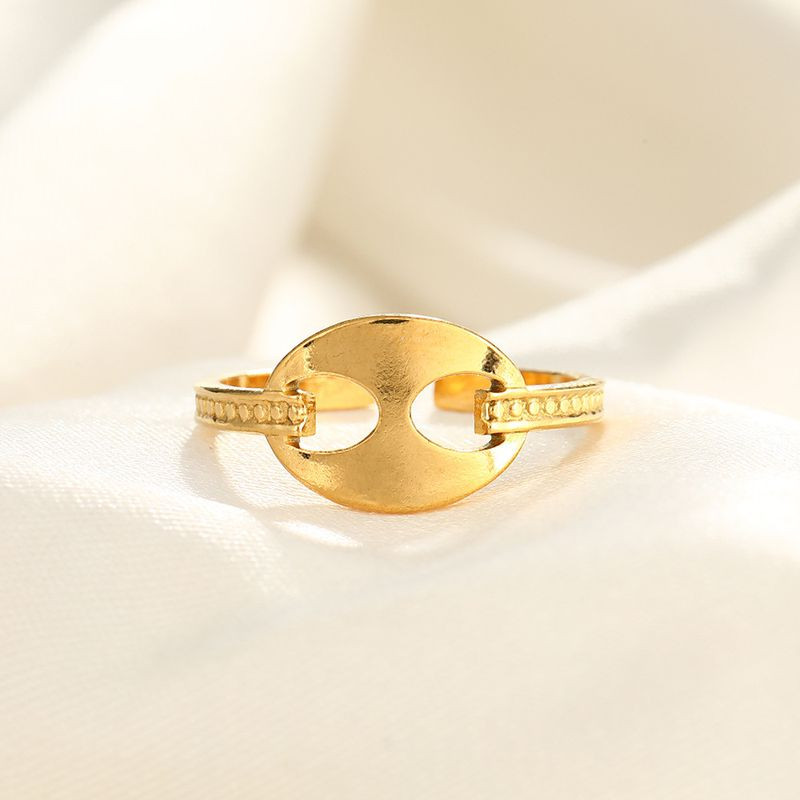 Разомкнутое золотистое кольцо с овальной прорезью 1J12374CJJ Разомкнутое золотистое кольцо с овальной прорезью 1J12374CJJ