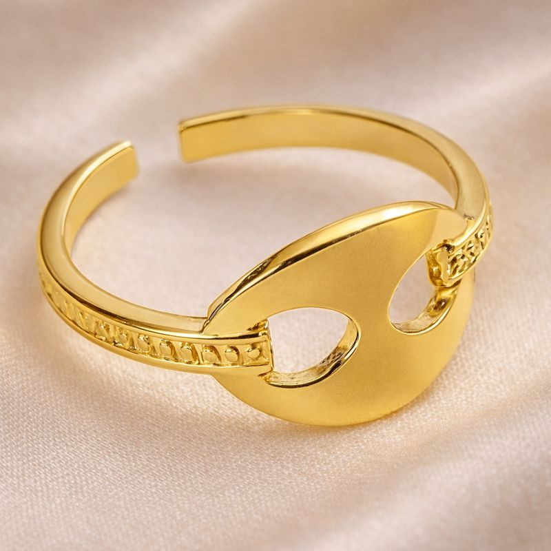 Разомкнутое золотистое кольцо с овальной прорезью 1J12374CJJ Разомкнутое золотистое кольцо с овальной прорезью 1J12374CJJ