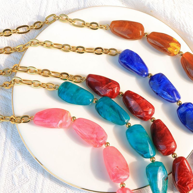 Браслет золотистый с крупными вставками под янтарь CJP93460 Браслет золотистый с крупными вставками под янтарь CJP93460