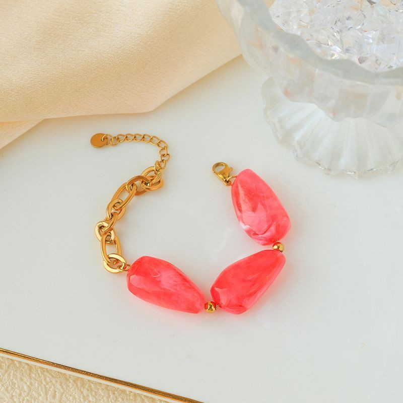 Браслет золотистый с крупными вставками под янтарь CJP93460 Браслет золотистый с крупными вставками под янтарь CJP93460