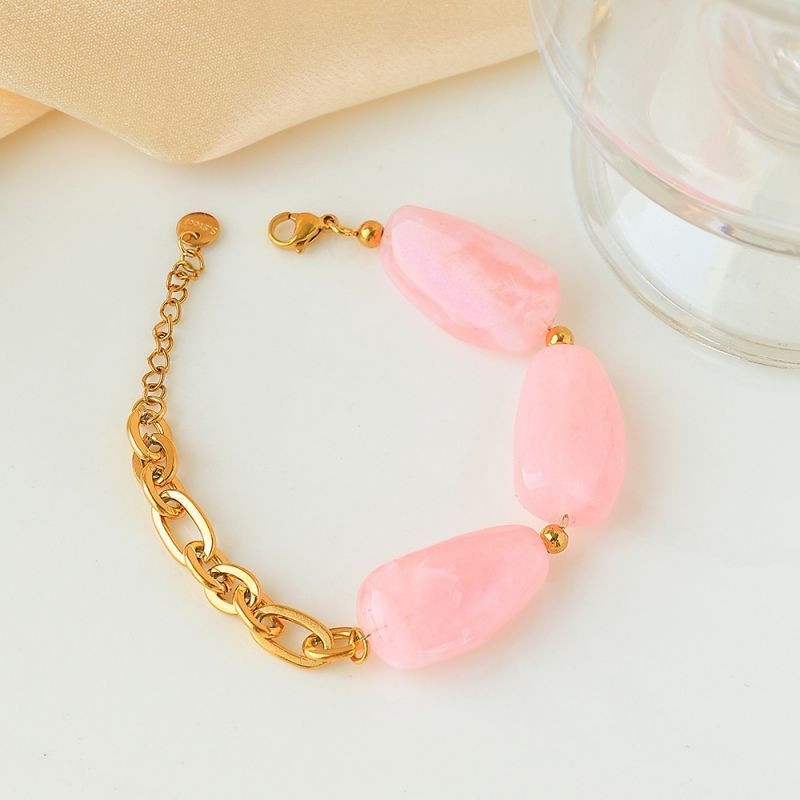 Браслет золотистый с крупными вставками под янтарь CJP93460 Браслет золотистый с крупными вставками под янтарь CJP93460