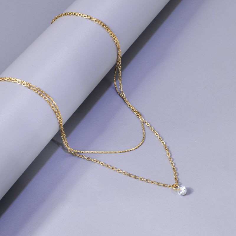 Двойная золотистая цепочка с жемчужиной CJL14419 Двойная золотистая цепочка с жемчужиной CJL14419